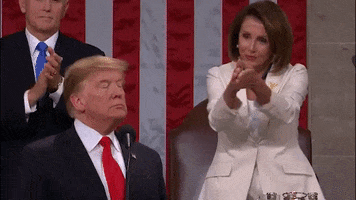 Political gif. Nancy Pelosi, hands outstretched deliberately, claps at Donald Trump.