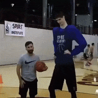 tall man basketball GIF
