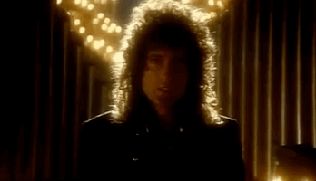 who wants to live forever queen GIF