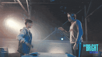 hero handshake by Dobre Brothers Bright Fight GIF Library