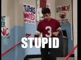 TV gif. Mario Lopez as Slater on Saved by the Bell runs down his high school steps with football in hand, points at us, and says, “stupid.”