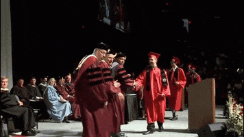 graduation moonwalking GIF