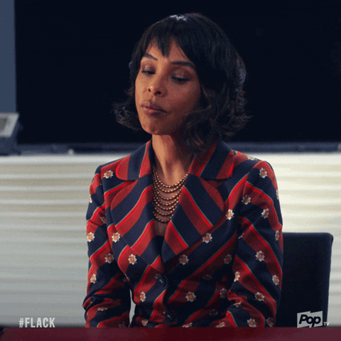 TV gif. Sophie Okonedo as Caroline in Flack nods her head in relief as she says, “Excellent.”