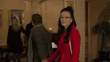 hesitate red coat GIF by Hallmark Movies & Mysteries