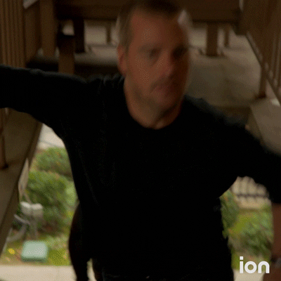 TV gif. LL Cool J as Sam Hanna in NCIS Los Angeles running hurriedly up a staircase.