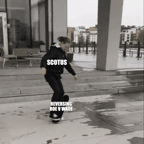 Meme gif. Woman clumsily falls off a skateboard as a man rides by on a bicycle with an umbrella. The skateboard rolls in front of the man's bike, sending him and the umbrella flying into an adjacent lake or canal. The woman is labeled, "S-C-O-T-U-S," the man and his umbrella are labeled "marriage equality" and "access to birth control," and the skateboard is labeled "reversing Roe v. Wade."