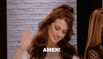 TV gif. A woman from ANTM with long brown hair slaps the table with a smile. Text, "Amen!"