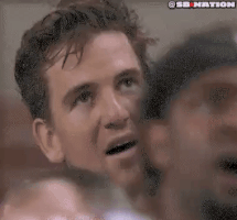 Sports gif. Eli Manning, mouth agape in indignant disbelief, mutters what the fuck.
