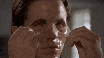 american psycho face mask GIF