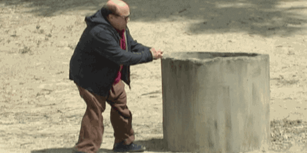 Gif of Danny DeVito in It's Always Sunny in Philadelphia dropping a match into a concrete pipe which promptly catches on fire. 