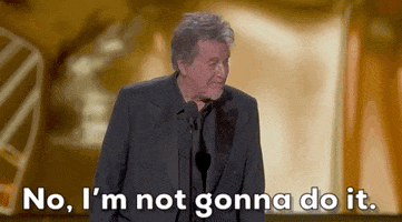 Oscars 2024 GIF. Al Pacino puts up his hands in a halting motion and says, "No, I'm not gonna do it."