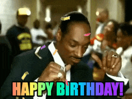 Celebrity gif. Snoop Dogg dances in a hallway with a bunch of people around him and he looks down and grooves. Text, "Happy Birthday!"