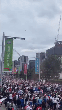 Fans Spotted on Rooftop Near Wembley as Crowd Breaks Through Stadium Barriers