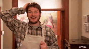 TV gif. Chris Pratt as Andy on Parks and Recreation looks straight at the camera as he cringes, gritting his teeth widely. He shakes his fists and then goes to bite his fist.
