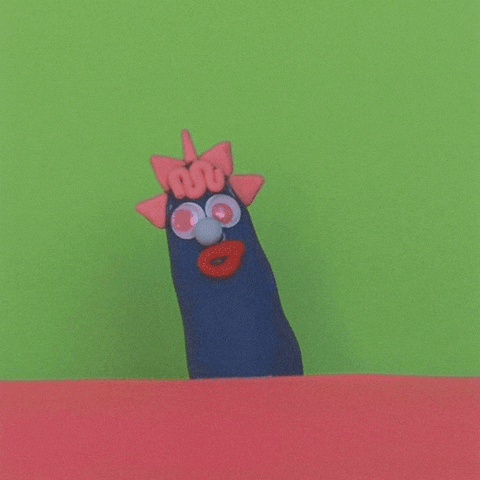 Cartoon gif. Blue creature made of clay with googly eyes, red lips, and spiky pink "hair". Text slides into frame: "Amen, sister!"