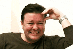 Ricky Gervais Laughing GIF