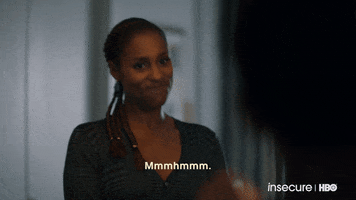 TV gif. Actress Issa Rae of Insecure emphatically nods her head with a straight smile. Text, "Mmmhmmm."