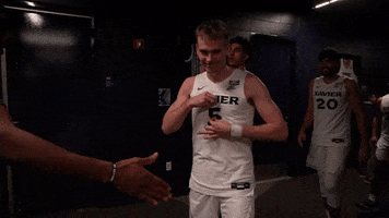Zip Up College Basketball GIF by Xavier Men's Basketball