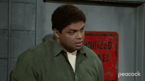 Close-up animated GIF of Charles Barkley shaking his head and looking dismayed
