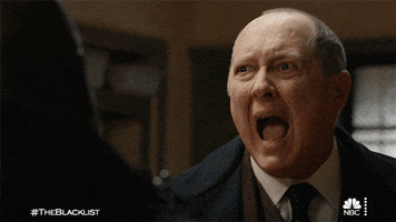 TV gif. James Spader as Raymond in The Blacklist yells in exasperation towards someone as he puts a palm to his face.