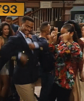 TV gif. Alfonso Ribeiro as Carlton on the Fresh Prince of Bel-Air dancing goofy with a girl at a house party.