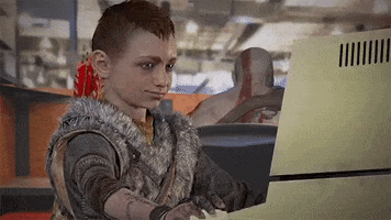 Video game gif. Atreus from God of War nods, looking at an old library computer and then looking over at us, nodding approvingly and giving a thumbs up.