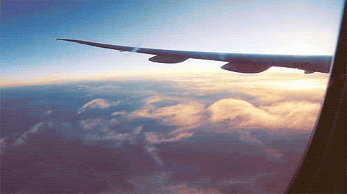  beautiful sky clouds plane airplane GIF