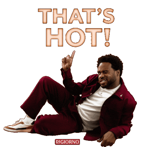 Sponsored sticker gif. Man lies on his side in a suggestive pose. He winks and points upward at floating text that reads, “That’s hot!”