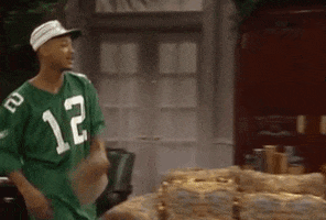 TV gif. Will Smith on The Fresh Prince of Bel-Air dabs up DJ Jazzy Jeff as Jazz and they both lean back and snap to finish their special greeting.