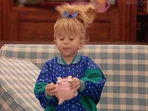 GIF of Full House child star Michelle trying to find money in piggy bank