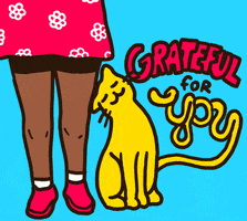 Illustrated gif. A yellow cat rubs its head on the legs of a girl standing next to it. Text, "Grateful for you."