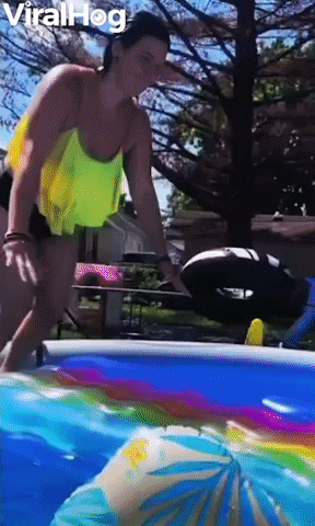 Woman Slides Straight Across Pool On Raft GIF by ViralHog