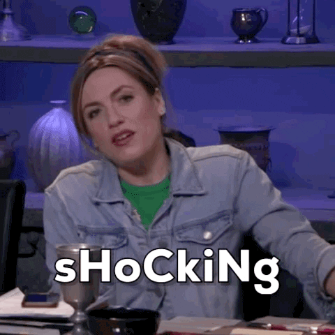 Gif of a white woman in a denim jacket saying 'shocking' 