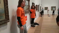 Climate Activists Glue Themselves to Van Gogh Painting at London Art Gallery