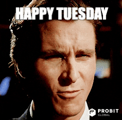 Movie gif. Christian Bale as Patrick Bateman in American Psycho makes a kissing face and smiles. Text reads, "Happy Tuesday."
