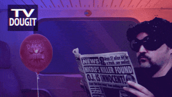 Video gif. Man sits in a subway that is lit with an ambient purple to red gradient. Despite the dim lighting, he wears dark sunglasses while flipping through a newspaper. Its headline reads, "Nicole's killer found O.J. is innocent!," and the man says bluntly, "Stupid," which appears as text in a speech bubble. A red balloon reading, "Welcome back! Dougs" sits across from him, and a bird's head randomly pops out from the bottom left corner. A graphic reading, "TV DougIt" resides in the top left.