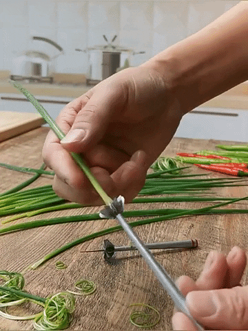 Stainless Steel Plum Blossom Onion Cutter GIF