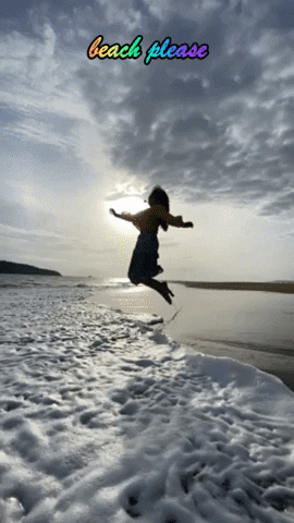 surbhikaushik sea waves girl dancing high jump GIF