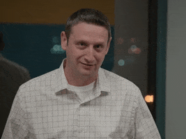 TV gif. Tim Robinson on "I Think You Should Leave with Tim Robinson" waves his head back awkwardly and sarcastically, as his eyes dart back and forth