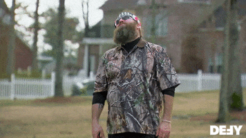 TV gif. Willie Robertson from Duck Dynasty throws his head back and groans, looking annoyed. His arms are loose at his sides and his head is bent, looking like he's over the entire situation. 