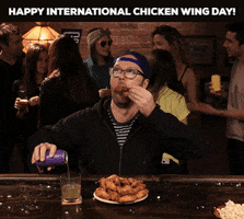 Chicken Wings Eating GIF by GIFiday
