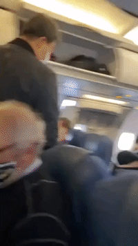 Passengers Fail to Observe Social Distancing While Boarding Air Canada Flight