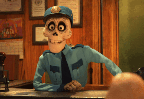 Movie gif. A skeleton in Coco wears a police uniform as it leans on a counter and reacts with surprise. Its eyes bug out and its jaw falls off, landing with a bounce on the counter.