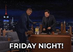 The Tonight Show gif. Jamie Foxx pumps his hand up and down as he stomps. Jimmy Fallon stands up behind his desk, clapping and laughing along with Jamie. Text, “Friday night!”