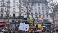 Demonstrators March in Paris During Ninth Day of Nationwide Protests