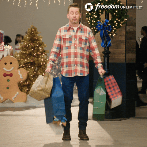 Sponsored gif. A Chase Freedom Unlimited card swipes back and forth as if making a purchase. Text: "'Tis the season. Member FDIC" 