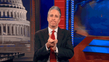 daily show slow clap GIF