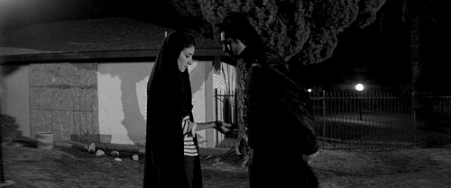 a girl walks home alone at night
