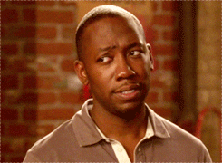 TV gif. Lamorne Morris as Winston on New Girl gives a quizzical look to the side, then glances down, raising his eyebrows and tightening his lips.