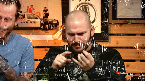 A man trying to work out complex equations by counting with his fingers